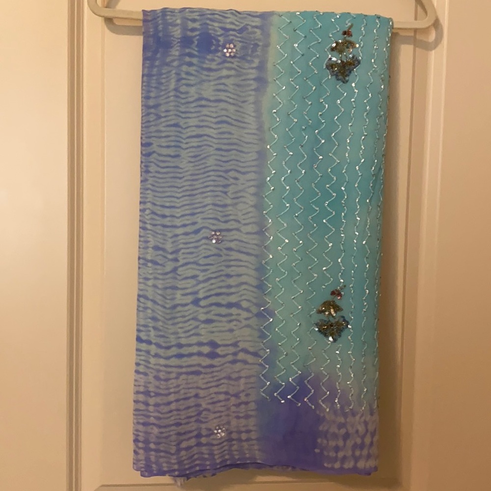 Light turquoise chiffon saree
